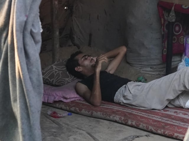 21 year old palestinian man fathi abdulal rests in a tent after being released from an israeli prison after 7 months in deir al balah gaza on july 27 2024  photo anadolu agency